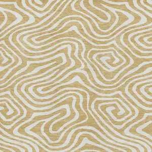 Photo of Gold And Ivory Abstract Washable Area Rug With UV Protection