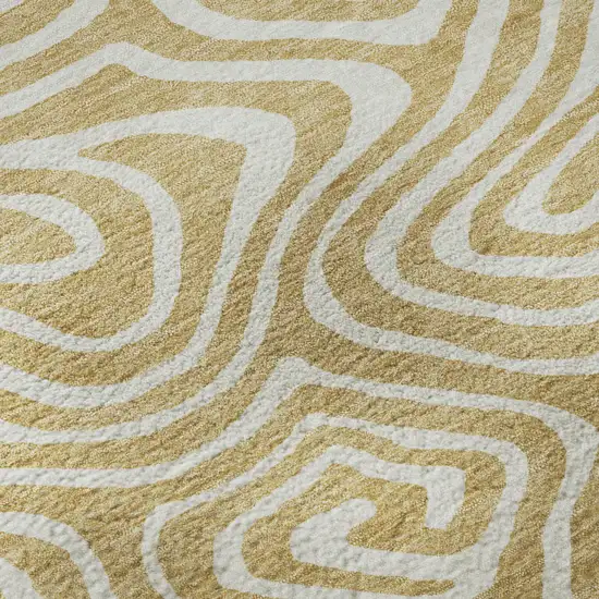Gold And Ivory Abstract Washable Area Rug With UV Protection Photo 9