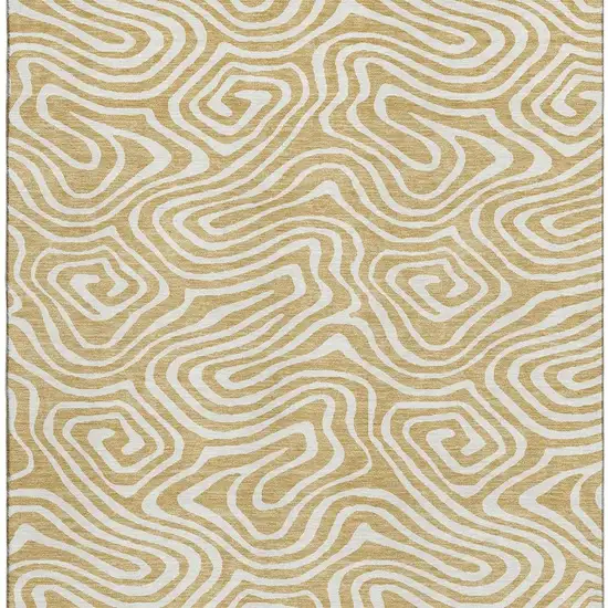 Gold And Ivory Abstract Washable Area Rug With UV Protection Photo 3