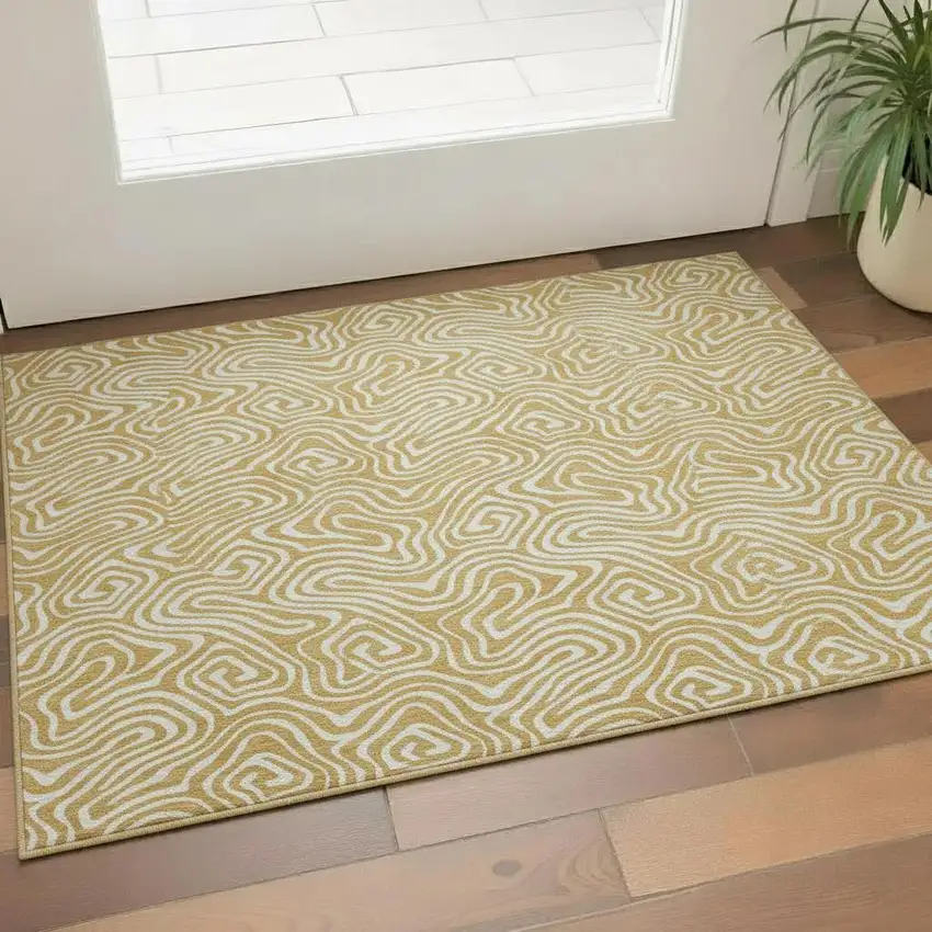 Gold And Ivory Abstract Washable Area Rug With UV Protection Photo 2