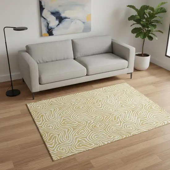 Gold And Ivory Abstract Washable Area Rug With UV Protection Photo 2