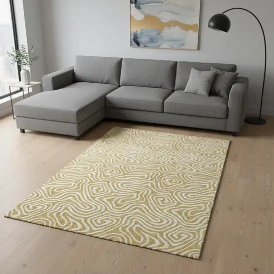 Gold And Ivory Abstract Washable Area Rug With UV Protection Photo 2