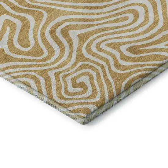 Gold And Ivory Abstract Washable Area Rug With UV Protection Photo 6