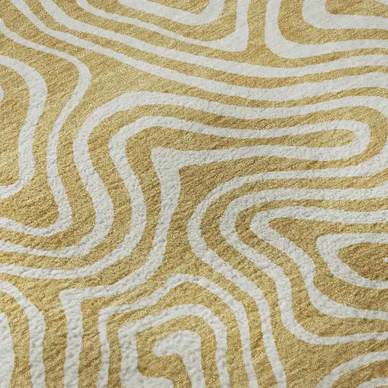 Gold And Ivory Abstract Washable Area Rug With UV Protection Photo 8