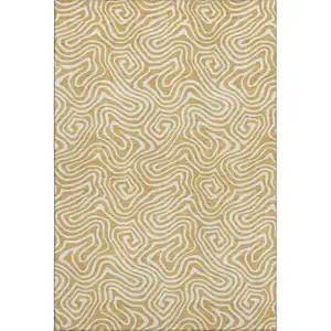 Photo of Gold And Ivory Abstract Washable Area Rug With UV Protection