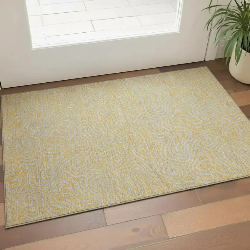 Gold And Ivory Abstract Washable Area Rug With UV Protection Photo 2