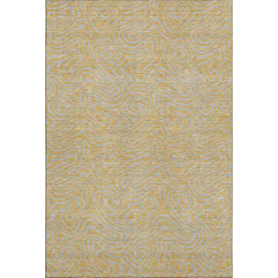 Gold And Ivory Abstract Washable Area Rug With UV Protection Photo 1