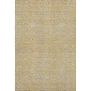 Photo of Gold And Ivory Abstract Washable Area Rug With UV Protection