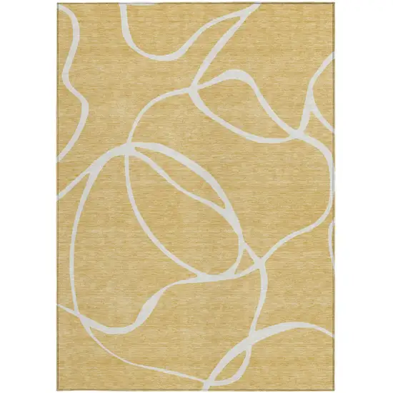 Gold And Ivory Abstract Washable Indoor Outdoor Area Rug Photo 7