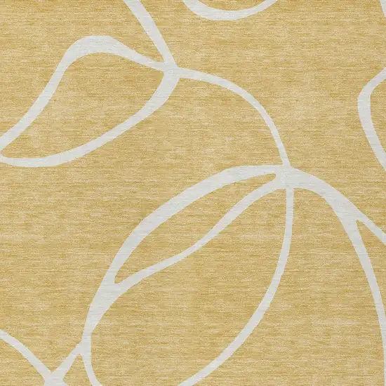 Gold And Ivory Abstract Washable Indoor Outdoor Area Rug Photo 5