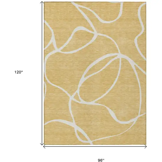 Gold And Ivory Abstract Washable Indoor Outdoor Area Rug Photo 3