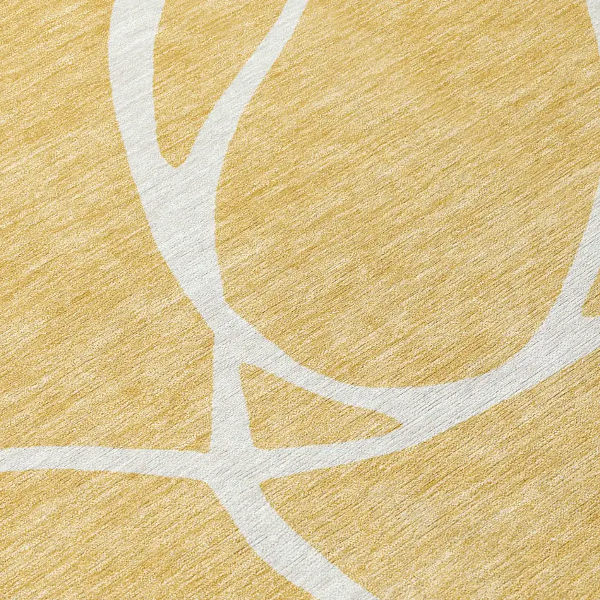 Gold And Ivory Abstract Washable Indoor Outdoor Area Rug Photo 6