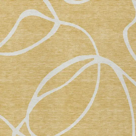 Gold And Ivory Abstract Washable Indoor Outdoor Area Rug Photo 5