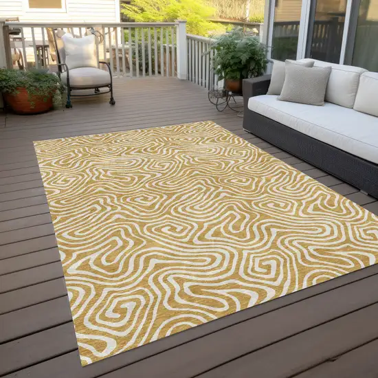 Gold And Ivory Abstract Washable Indoor Outdoor Area Rug Photo 8