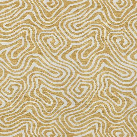 Gold And Ivory Abstract Washable Indoor Outdoor Area Rug Photo 7