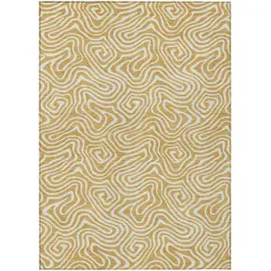 Photo of Gold And Ivory Abstract Washable Indoor Outdoor Area Rug