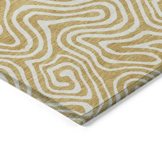 Gold And Ivory Abstract Washable Indoor Outdoor Area Rug Photo 5