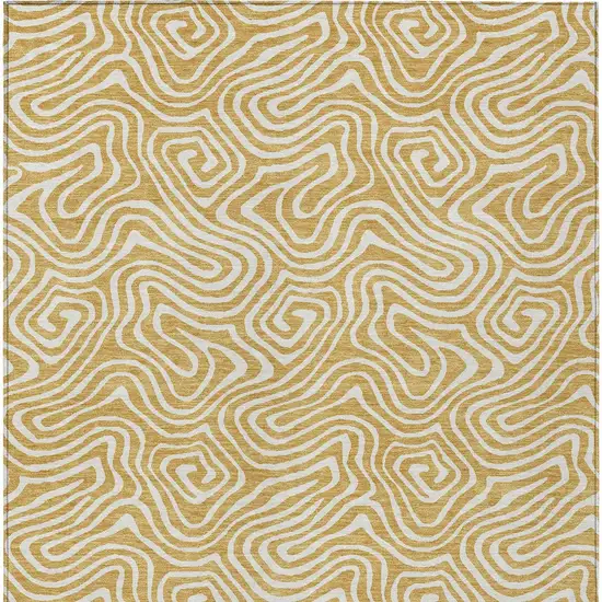 Gold And Ivory Abstract Washable Indoor Outdoor Area Rug Photo 8