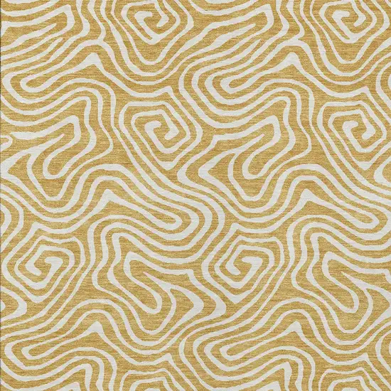 Gold And Ivory Abstract Washable Indoor Outdoor Area Rug Photo 7