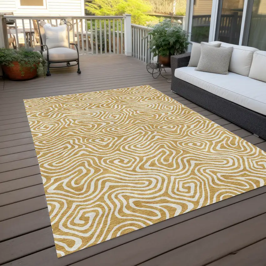 Gold And Ivory Abstract Washable Indoor Outdoor Area Rug Photo 9