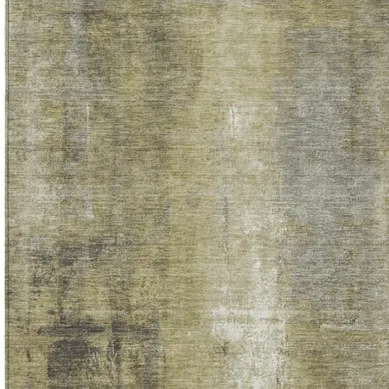 Gold And Ivory Abstract Washable Indoor Outdoor Area Rug Photo 3