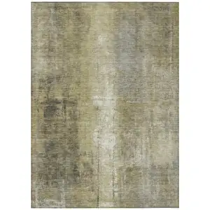 Photo of Gold And Ivory Abstract Washable Indoor Outdoor Area Rug