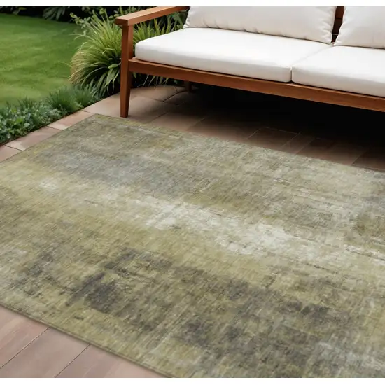 Gold And Ivory Abstract Washable Indoor Outdoor Area Rug Photo 2