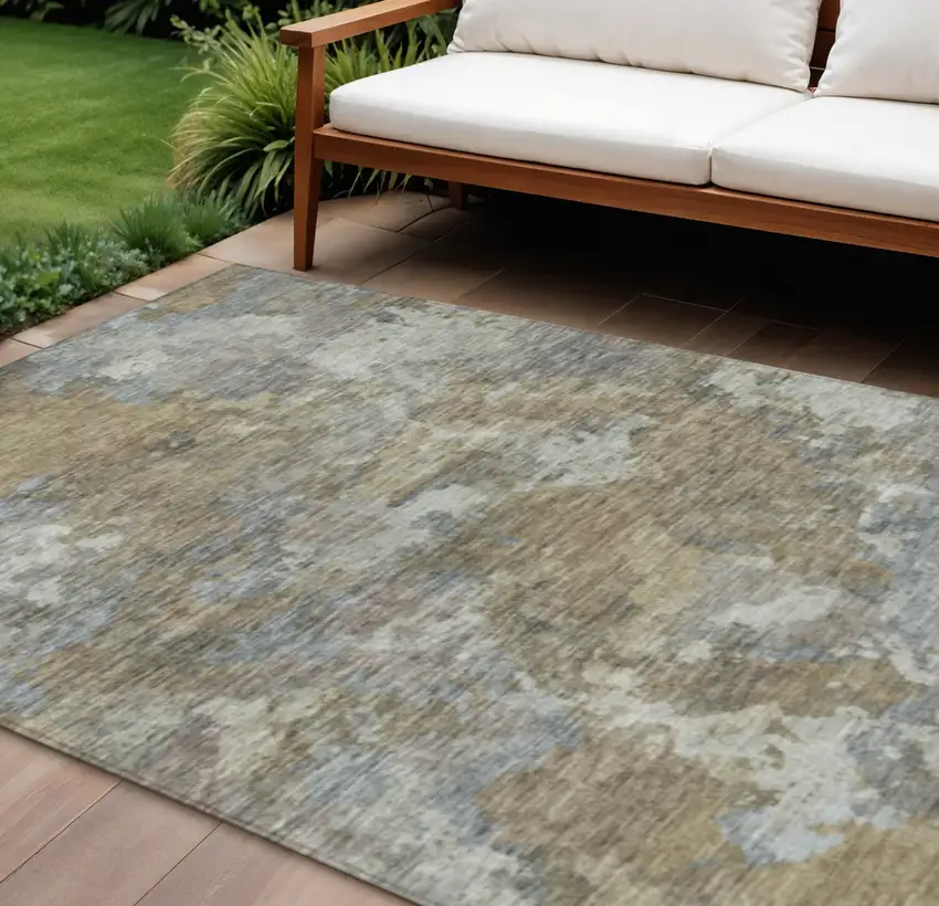 Gold And Ivory Abstract Washable Indoor Outdoor Area Rug Photo 2