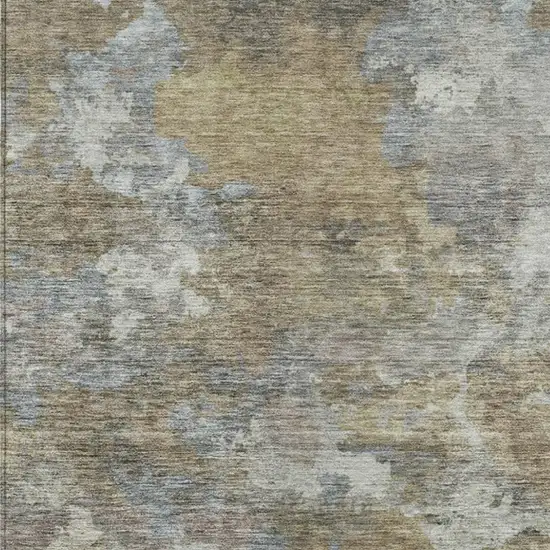 Gold And Ivory Abstract Washable Indoor Outdoor Area Rug Photo 9