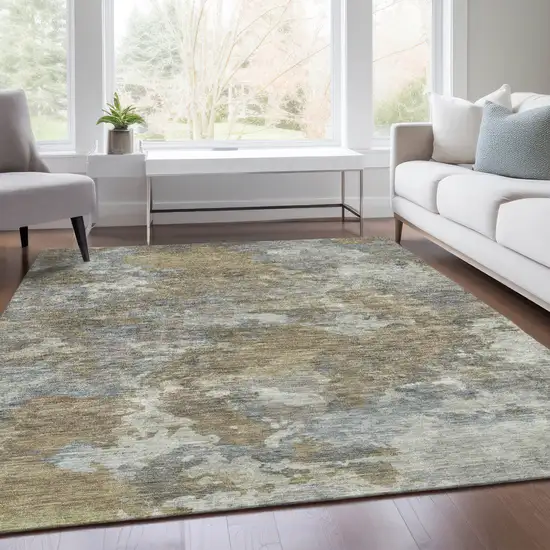 Gold And Ivory Abstract Washable Indoor Outdoor Area Rug Photo 5