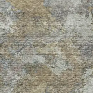 Photo of Gold And Ivory Abstract Washable Indoor Outdoor Area Rug