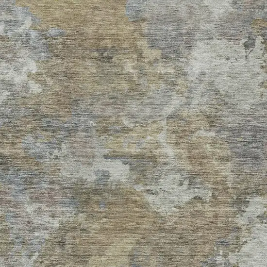 Gold And Ivory Abstract Washable Indoor Outdoor Area Rug Photo 1