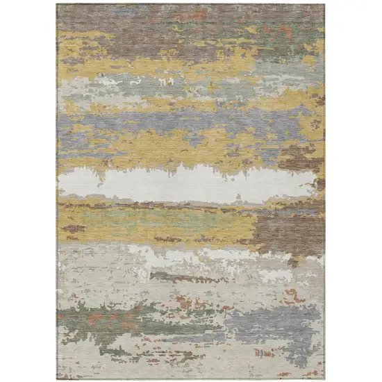 Gold And Ivory Abstract Washable Indoor Outdoor Area Rug Photo 1
