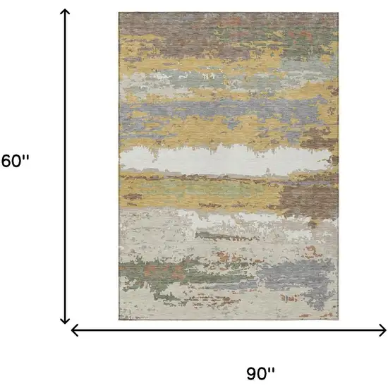 Gold And Ivory Abstract Washable Indoor Outdoor Area Rug Photo 6