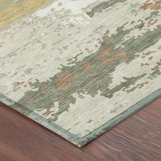Gold And Ivory Abstract Washable Indoor Outdoor Area Rug Photo 4