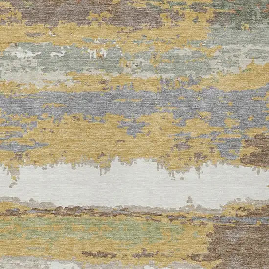 Gold And Ivory Abstract Washable Indoor Outdoor Area Rug Photo 2