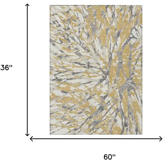 Gold And Ivory Abstract Washable Indoor Outdoor Area Rug Photo 8