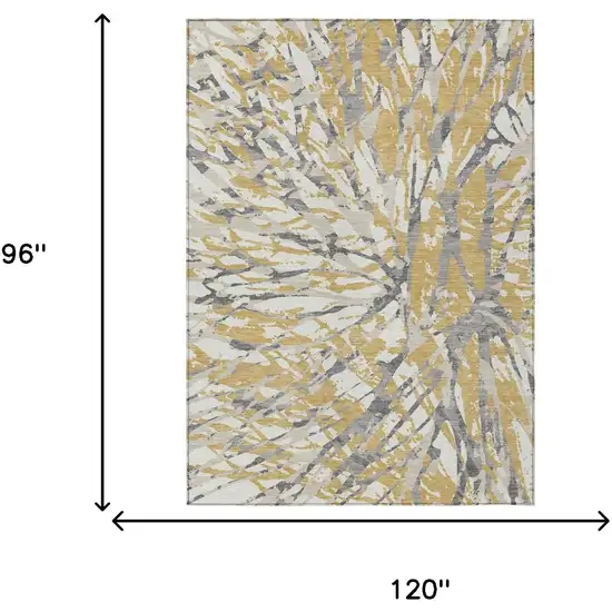 Gold And Ivory Abstract Washable Indoor Outdoor Area Rug Photo 9