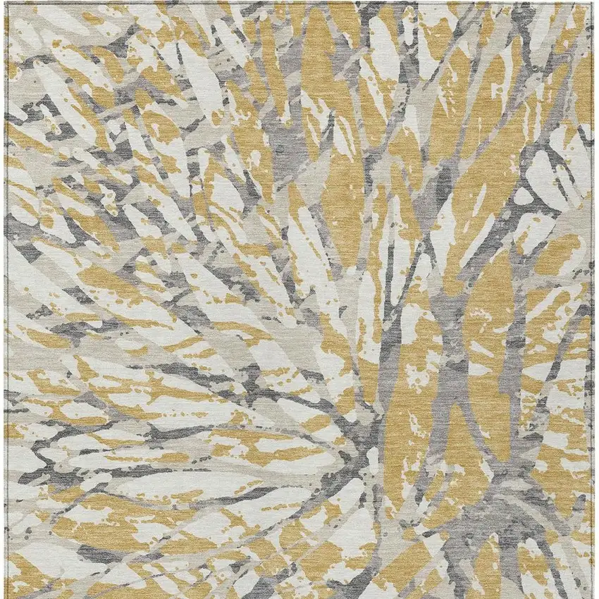 Gold And Ivory Abstract Washable Indoor Outdoor Area Rug Photo 6