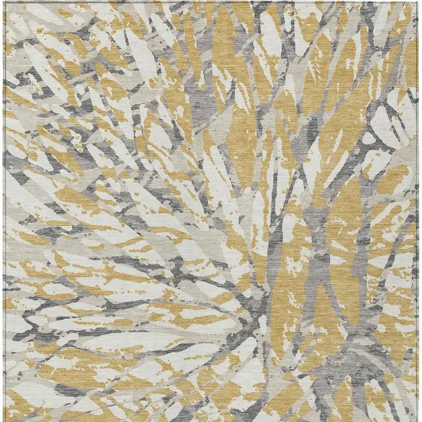 Gold And Ivory Abstract Washable Indoor Outdoor Area Rug Photo 4