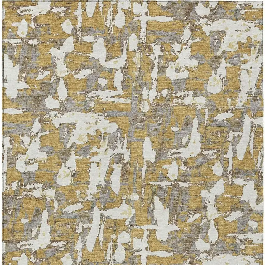 Gold And Ivory Abstract Washable Indoor Outdoor Area Rug Photo 6