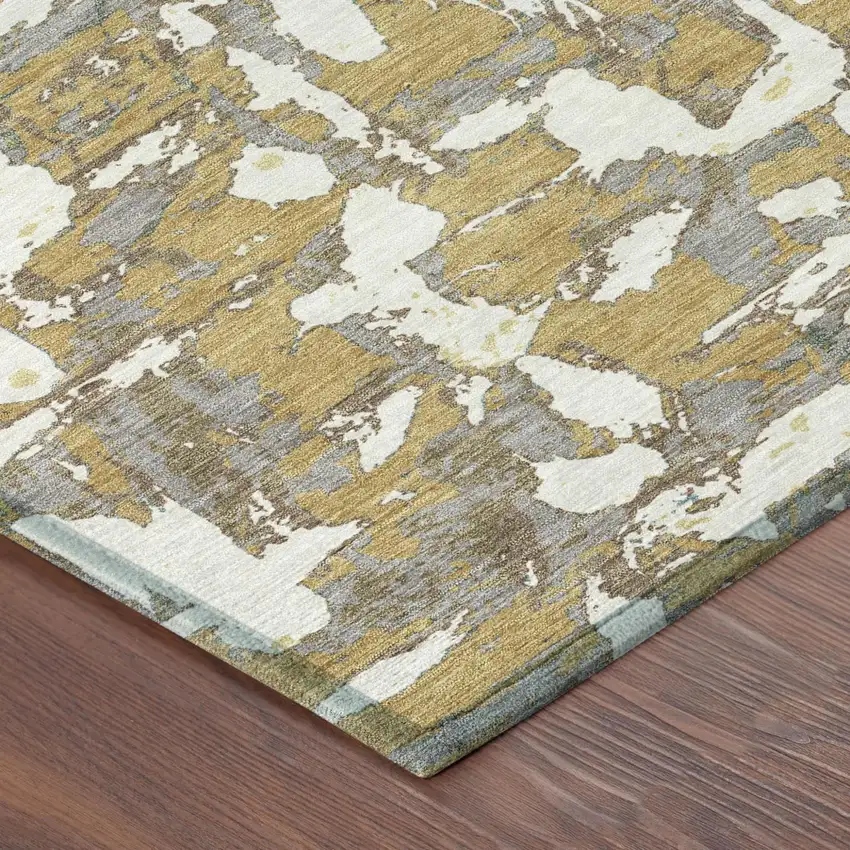 Gold And Ivory Abstract Washable Indoor Outdoor Area Rug Photo 7
