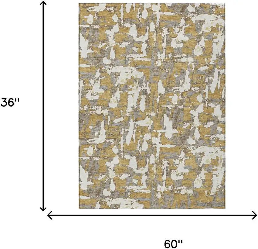 Gold And Ivory Abstract Washable Indoor Outdoor Area Rug Photo 9