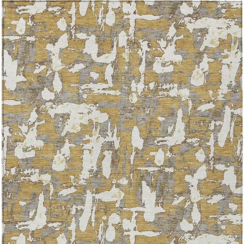 Gold And Ivory Abstract Washable Indoor Outdoor Area Rug Photo 4