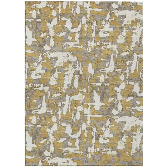 Gold And Ivory Abstract Washable Indoor Outdoor Area Rug Photo 2