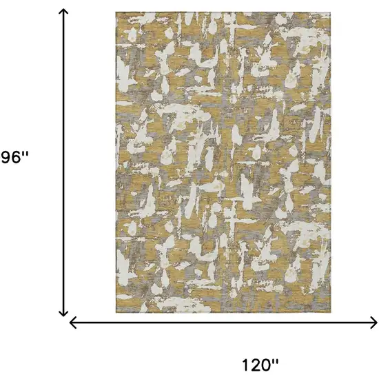 Gold And Ivory Abstract Washable Indoor Outdoor Area Rug Photo 9