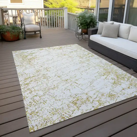 Gold And Ivory Abstract Washable Indoor Outdoor Area Rug Photo 8