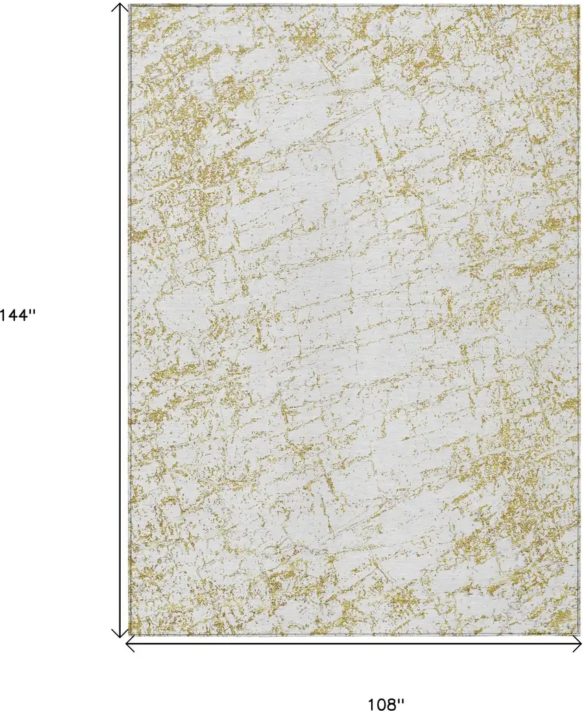 Gold And Ivory Abstract Washable Indoor Outdoor Area Rug Photo 3