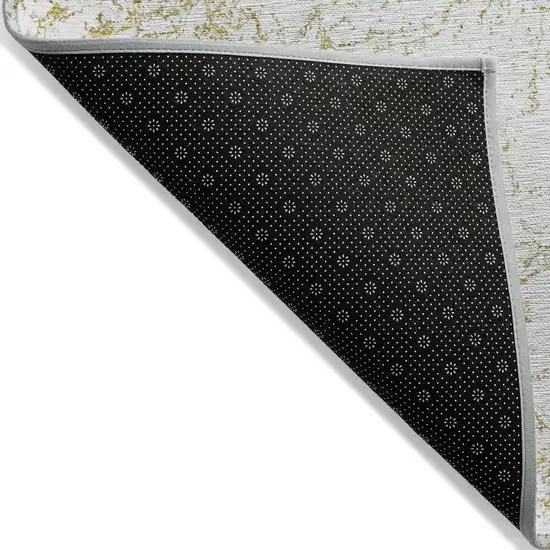 Gold And Ivory Abstract Washable Indoor Outdoor Area Rug Photo 4