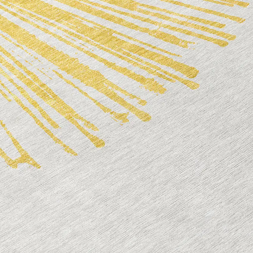 Gold And Ivory Abstract Washable Indoor Outdoor Area Rug Photo 3